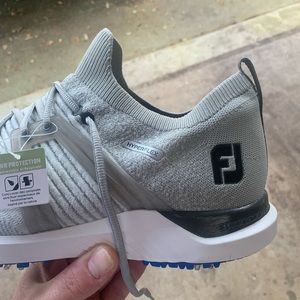 FootJoy men’s golf shoes.  Size 14 and grey in color